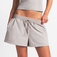 NikeSKIMS WOVEN NYLON 5" TRACK SHORT | STONE