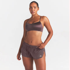 NikeSKIMS STRETCH NYLON RUNNER SHORT | RESIN