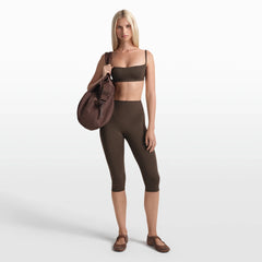 NikeSKIMS MATTE 17" V-LINE CAPRI LEGGING | DARK SEPIA