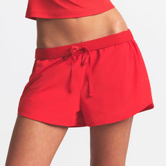 NikeSKIMS WOVEN NYLON 2.5" RUNNER SHORT | RUBY