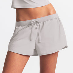 NikeSKIMS WOVEN NYLON 2.5" RUNNER SHORT | STONE