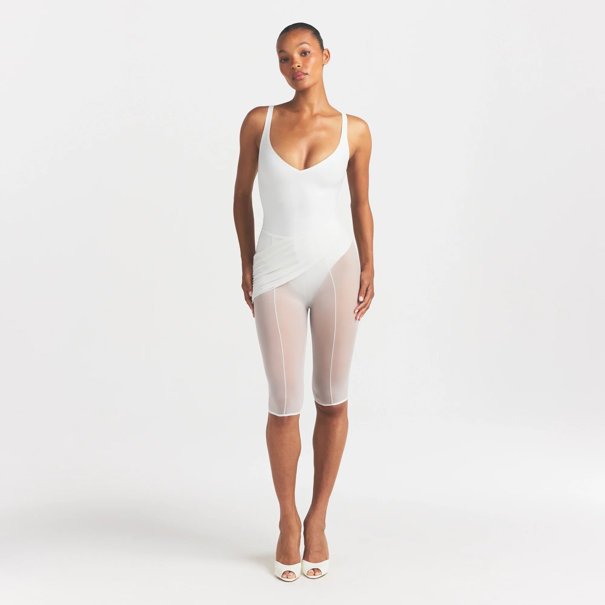 SKIMS BODY UNLINED PLUNGE THONG BODYSUIT | IVORY