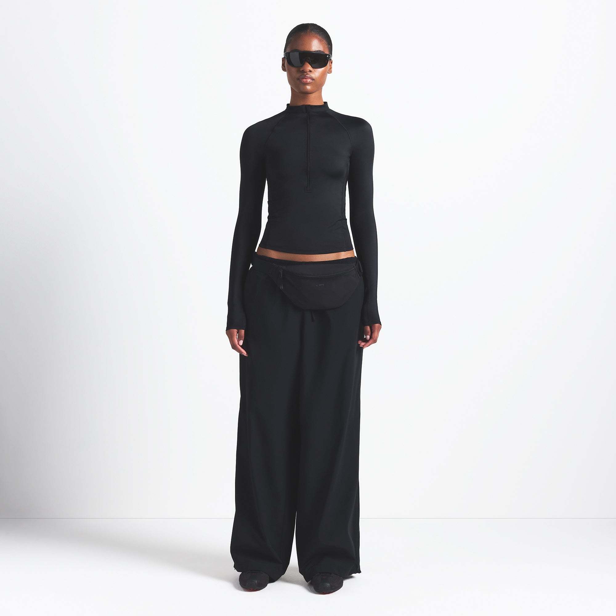 NikeSKIMS WOVEN NYLON OVERSIZED TRACK PANT | OBSIDIAN