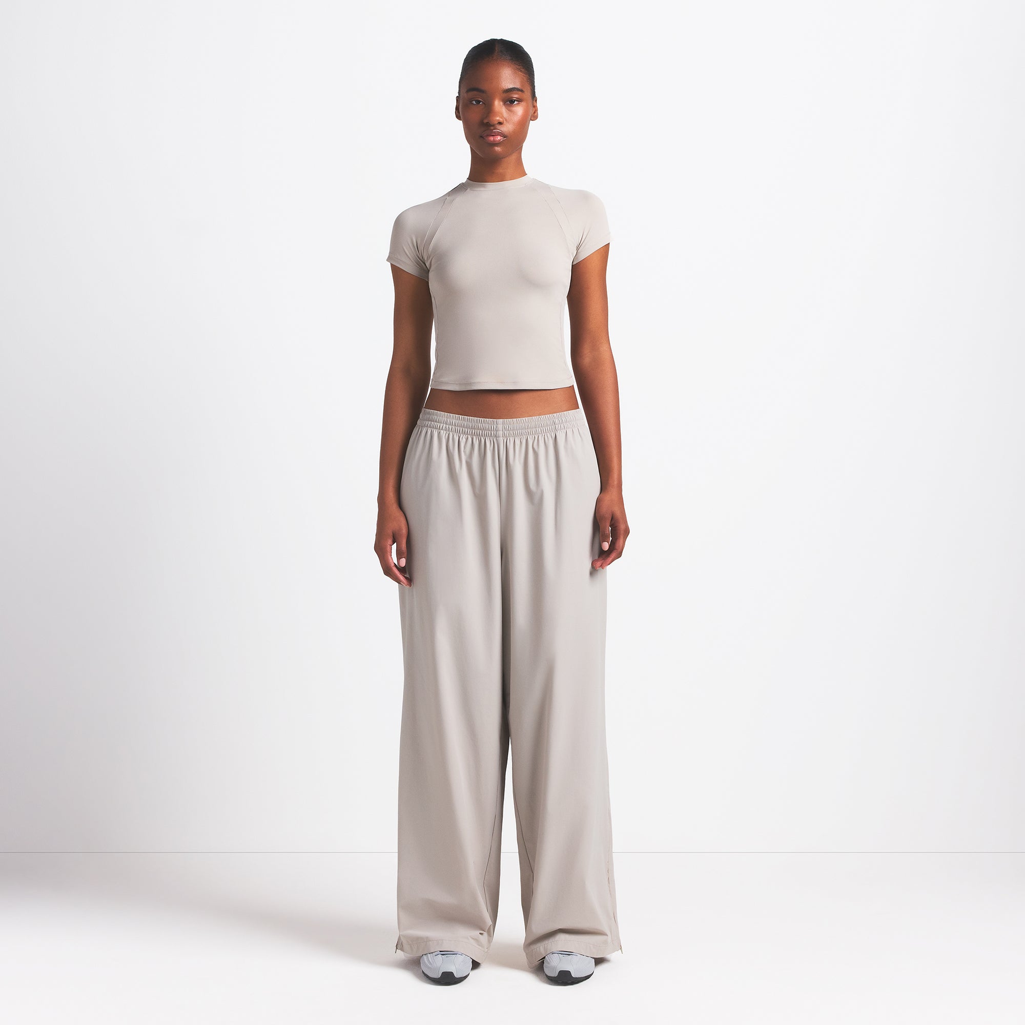 NikeSKIMS WOVEN NYLON OVERSIZED TRACK PANT | STONE