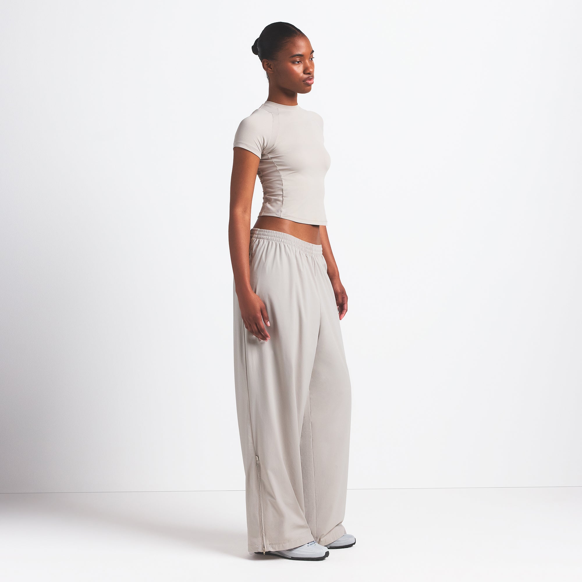 NikeSKIMS WOVEN NYLON OVERSIZED TRACK PANT | STONE