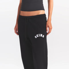 COTTON FLEECE CLASSIC JOGGER | ONYX SNOW ARCHED SKIMS LOGO