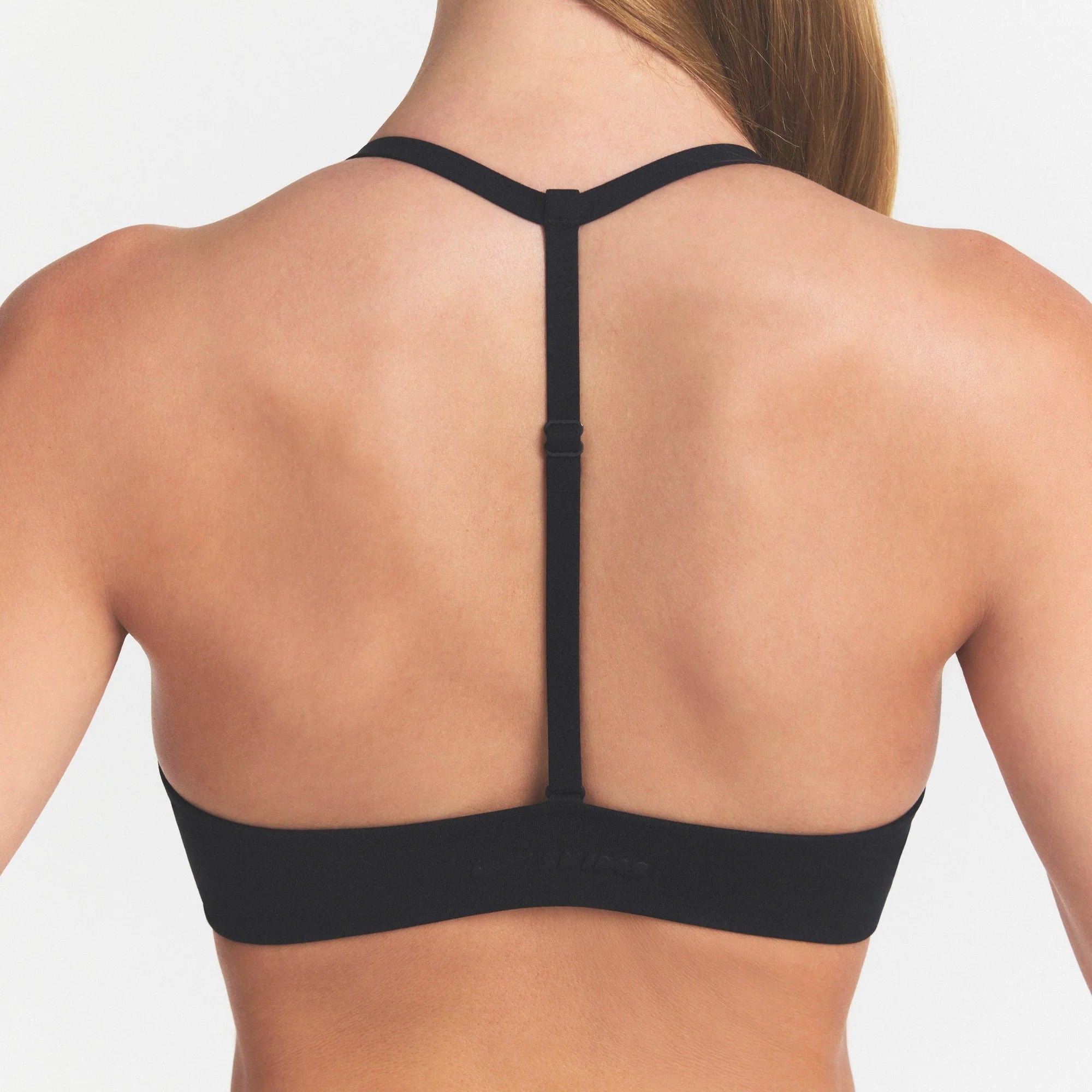NikeSKIMS STUDIO STRETCH T-BACK TRIANGLE BRA | OBSIDIAN