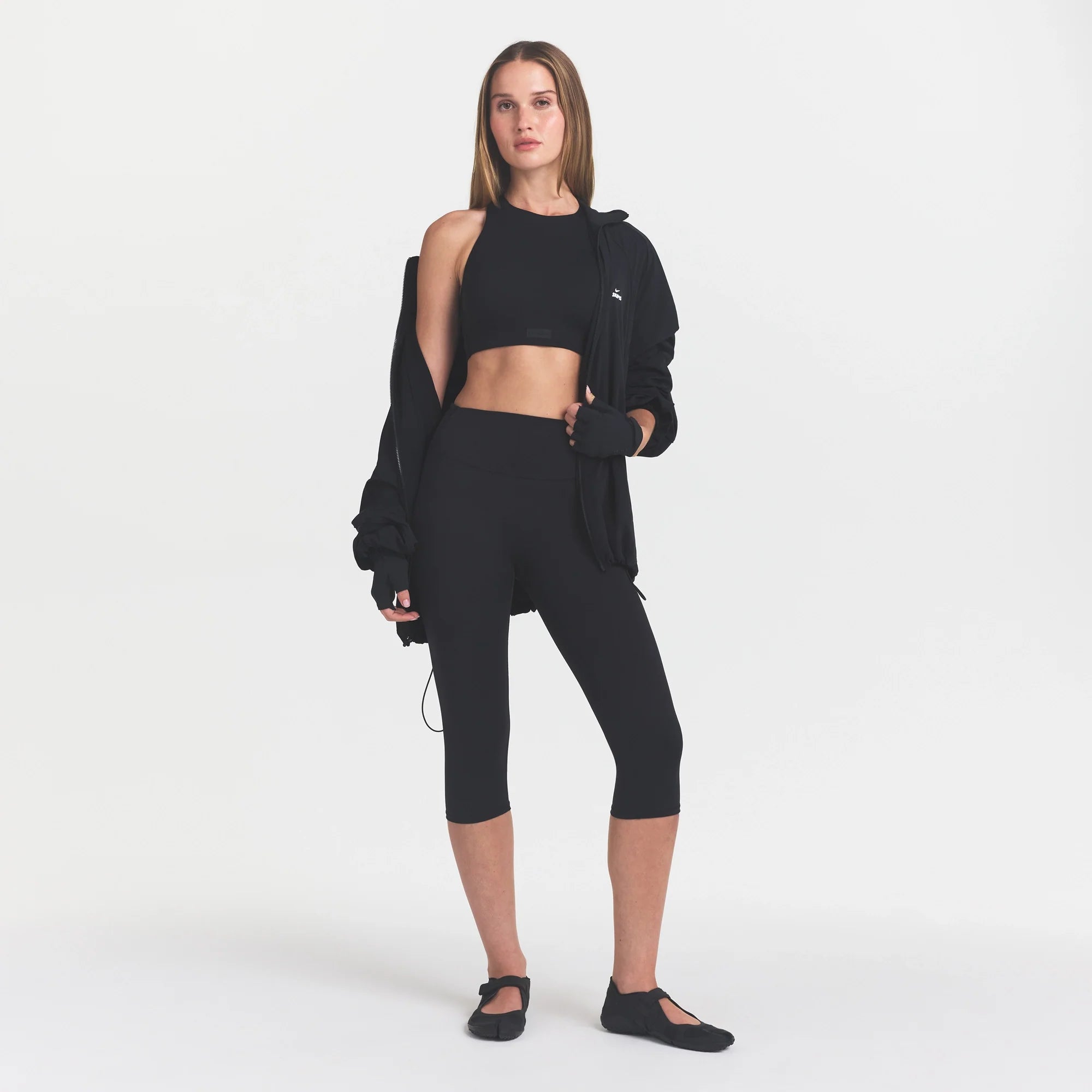 NikeSKIMS MATTE 17" CAPRI LEGGING | OBSIDIAN
