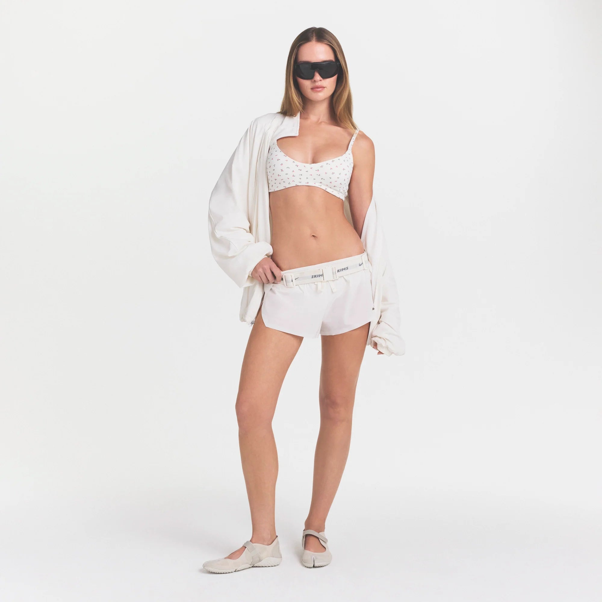 NikeSKIMS STRETCH NYLON OVERSIZED TRACK JACKET | IVORY