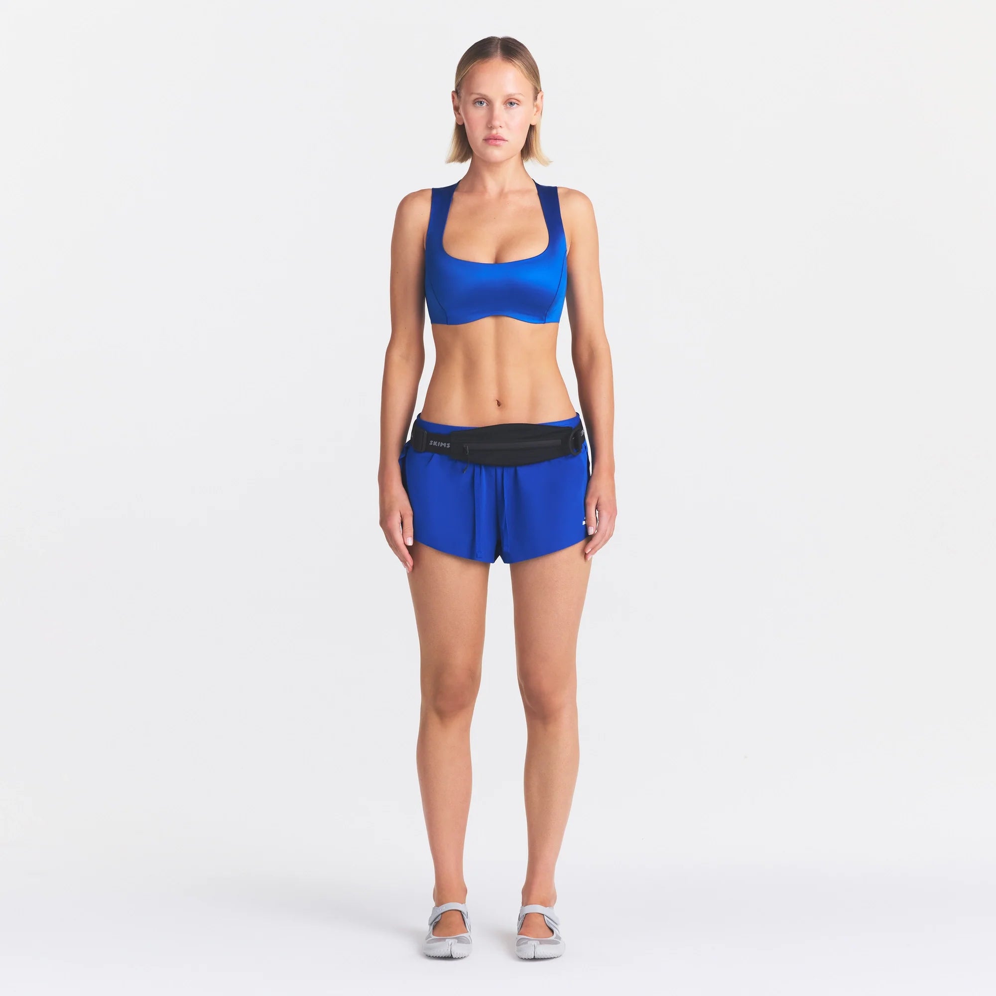 NikeSKIMS STRETCH NYLON RUNNER SHORT | COBALT