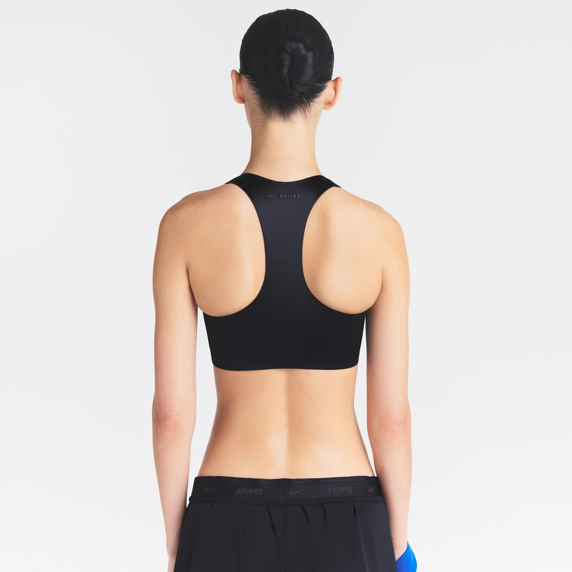 NikeSKIMS SATIN SHINE RACERBACK ZIP FRONT BRA | OBSIDIAN
