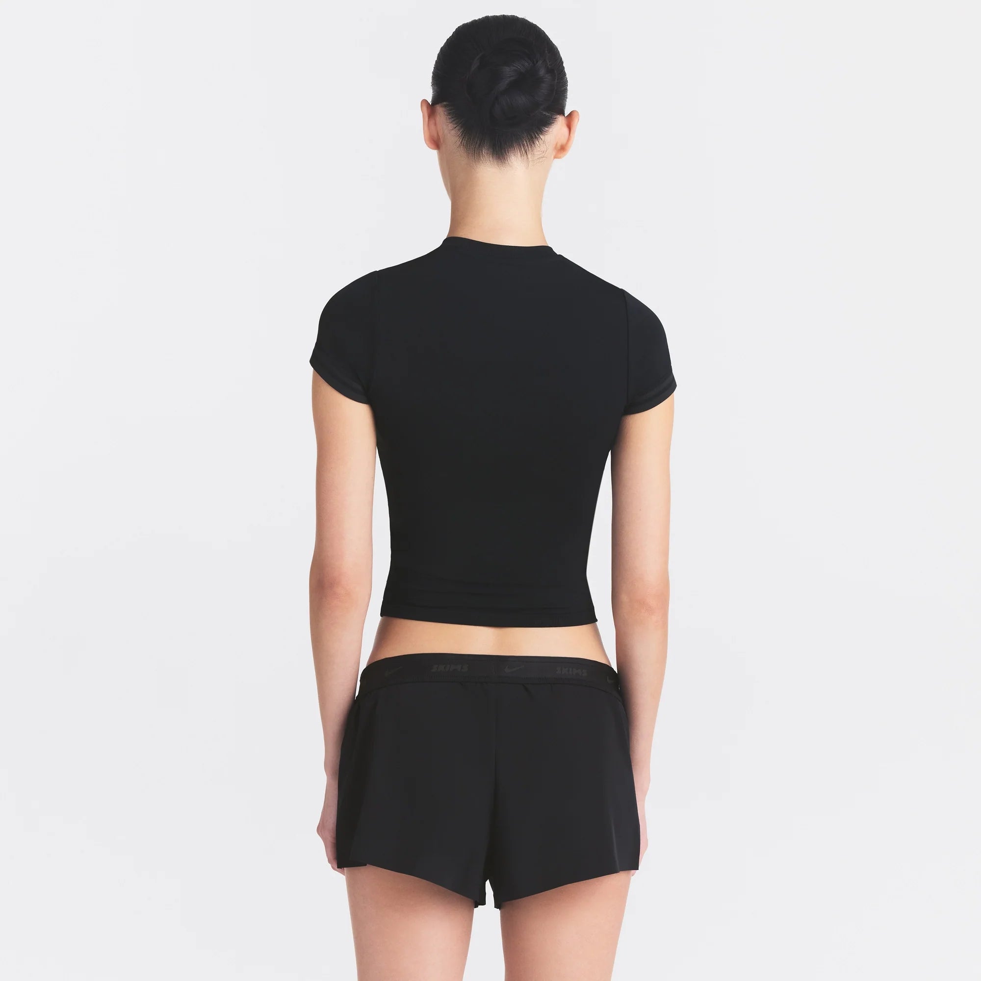 NikeSKIMS STRETCH KNIT CROPPED T-SHIRT | OBSIDIAN