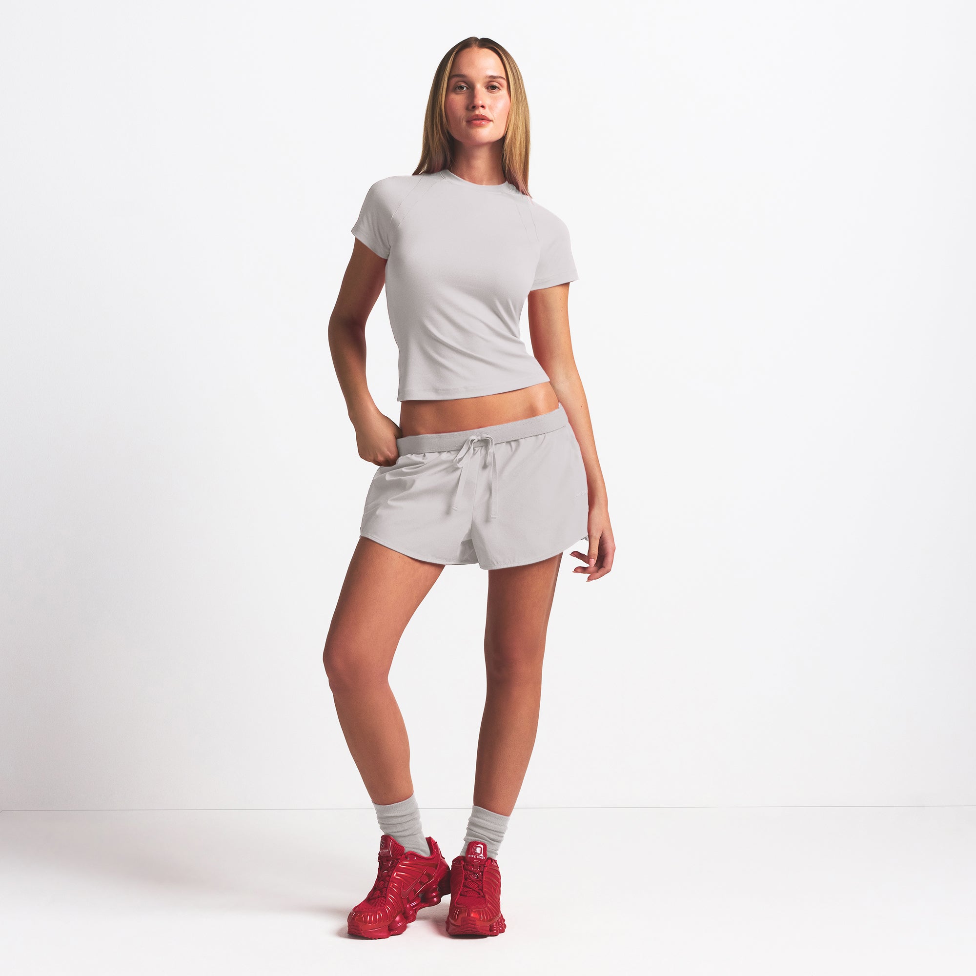 NikeSKIMS WOVEN NYLON 2.5" RUNNER SHORT | STONE