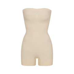 SEAMLESS SCULPT STRAPLESS SHORTIE BODYSUIT | SAND